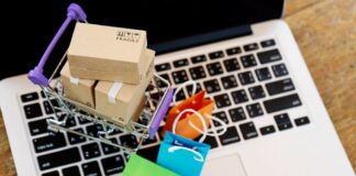 5 Best E-commerce Website Design Strategies to Skyrocket Sales ecommerce site on laptop with little boxes to skyrocket sales