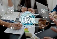 Understanding Test Cases vs. Test Scenarios software developers at desk understanding test cases with tech graphic overlay