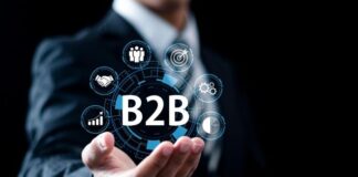 Unlock the Secrets to B2B Success: How Companies Redefine Growth in 2025 businessman holding hand out with B2B success graphic floating above