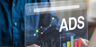 Effectiveness of Ad Exchanges: A Guide for CTOs and Product Managers Ad exchanges shown with person on laptop with ads graphic hovering above