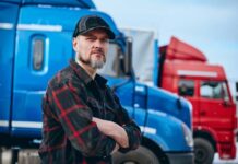Faster Policy Issuance: Technology Transforms Commercial Auto Insurance man in front of truck fleet, for commercial auto insurance