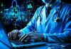 The Importance of Cybersecurity in Healthcare cybersecurity in healthcare shown with a doctor on a laptop, with lock graphics