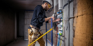 Innovations in Electrical Conduit Sealing: Enhancing Safety & Efficiency contractor working on electrical conduit sealing in a house