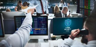 Why On-Premise MFA is the Future of Enterprise Security Enterprise security office with workers and desktop computers