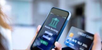 How to Integrate Loan Features into Mobile Banking Apps smartphone and credit card being used with loan features on banking app