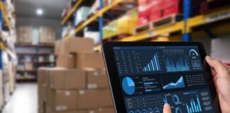 Boost Retail Efficiency with Trade Promotion Management Software retail efficiency shown in warehouse with tablet and graphs