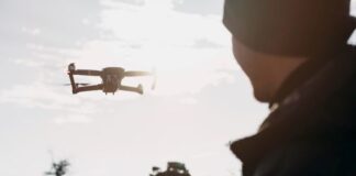 Drones for Rodent Control: Aerial Surveillance for Entry Points rodent control drone in field with pest control professional