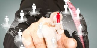 How to Export Leads from Sales Nav sales nav generating leads, shown with hand pointing at digital people on globe in foreground