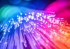 7 Reasons to Switch to Fiber Internet Today reasons to switch to fiber internet shown with rainbow colored LED fiber lights