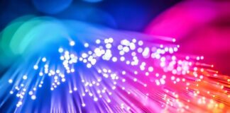 7 Reasons to Switch to Fiber Internet Today reasons to switch to fiber internet shown with rainbow colored LED fiber lights