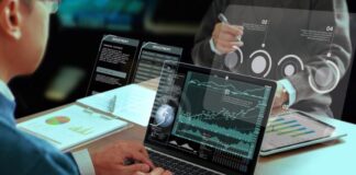 The Role of ERP Systems in Accelerating Digital Transformation SRP systems shown with man on laptop, with graphs in foreground