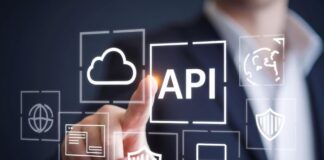 How Zuplo APIāManagement Saves You Time and Money Person touching API icon on screen in foreground, for Zuplo API