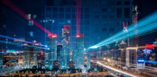 From Idea to Reality: The Ultimate Guide to Custom Application DevelopmentĀ modern business custom application development, shown with city scape and light trails