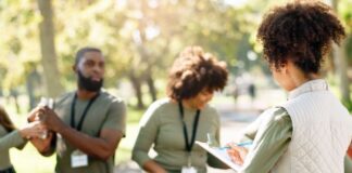 How to Automate Volunteer Scheduling for Maximum Efficiency automated volunteer scheduling, shown with busy people helping in park