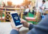 Analyzing the Market: The Growing Demand for Guest WiFi Solutions customer using guest WiFi at a cafe