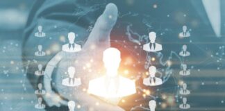 How Headless CMS Enhances Employee Portals and Internal Knowledge Bases headless CMS helps employees, shown with hand outstretched with people icons in foreground