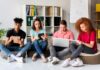 High Admission Rate Colleges: What You Should Know students at a high-admission college working together on devices