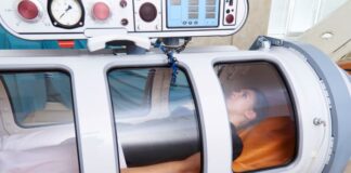 Discover Hyperbaric Oxygen Tech in Los Angeles: Wellness at its Peak lady in hyperbaric oxygen chamber