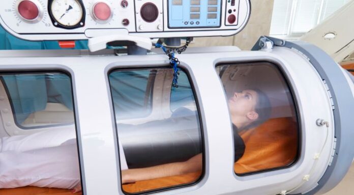 Discover Hyperbaric Oxygen Tech in Los Angeles: Wellness at its Peak lady in hyperbaric oxygen chamber