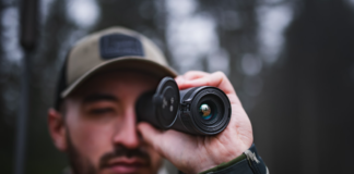 Night Vision vs Thermal: Comparative Tech Analysis of Modern Monoculars man using modern monoculars in foregest