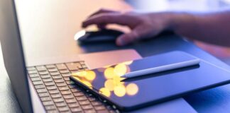 CoinTracking.info: The Smartest Crypto Tax and Portfolio Tool in 2025 man on tablet and laptop using portfolio tools