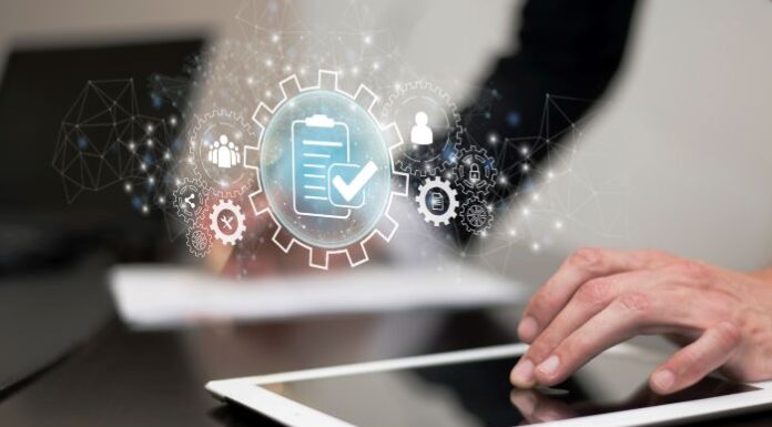 6 Benefits of Real-Time Collaboration In Contract Management Software real-time collaboration, shown with hand on tablet with icons in foreground