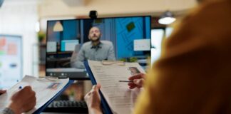 IT Job Interview: How Not to Do It IT job interview with candidate on screen and two recruiters