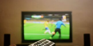 Stream Struggle? KroozTVHD Could Be your Fix KroozTVHD on screen with remote in foreground