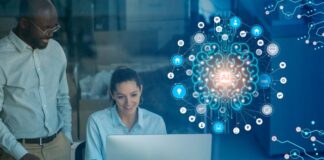 Smarter, Not Harder: Empowering SMB Automation with AI SMB automation shown with worker using AI tools