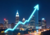 Key Factors for Successful Business Development in Charlotte business development shown with graph in foreground over city scape at night