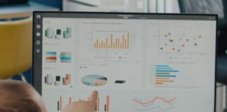 Creating Custom Dashboard Experiences in Headless CMS custom dashboard for CMS, shown with graphs on a monitor