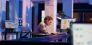 Dev Productivity Starts with the Tools No One Talks About woman at work station using tools to help with dev productivity