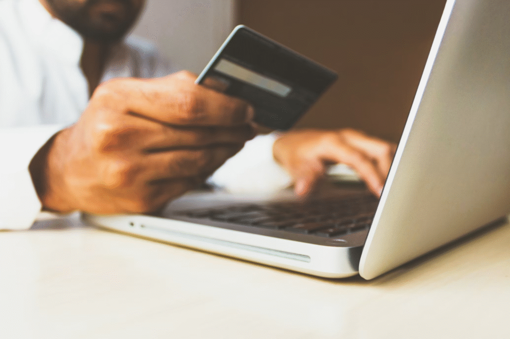 manager using credit card to pay global employees