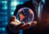Three Tricks Fintechs Use for Cheaper Money on International Transfers  man holding glass globe to show international transfers