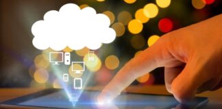 What is a Mac in the Cloud? Mac in the cloud, shown with hand on tablet