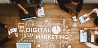 11 Digital Marketing Tactics for Redefining Business Growth digital marketing tactics for business growth with graphics on table