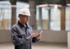 Streamline Job Site Accounting: Mobile Tools for Electricians electrician using mobile tools to connect his field work with the back office