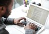 New Study: Best Ways to Organize Writing Projects organize writing on a laptop, shown with man typing a paper