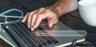 Tips for Finding the Ultimate Search Engine Tool search engine tool in foreground over laptop