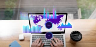How Meta Tag Checkers Can Boost Your Website’s Search Visibility search visibility shown with man on laptop and graphs in foreground