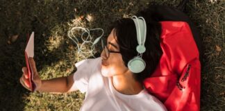 The Role of Artificial Intelligence in Shaping the Future of Daily Life AI is shaping the future, shown with boy watching tablet wearing headphones