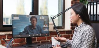 Demystifying Technical Interview Questions: What You Need to Know woman having a technical interview with a man on zoom