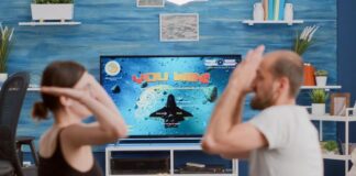 Advanced Ways to Save on Streaming, Gaming, and Software Services couple learning ways to save on gaming