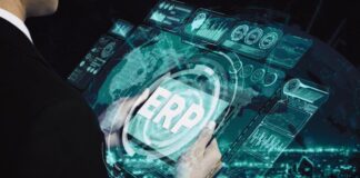 The Role of Odoo ERP Integration in Enhancing Data Accuracy & Reporting ERP integration with a tablet and tech graphics in foreground