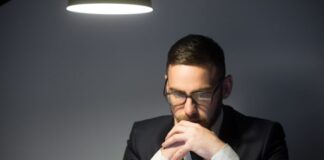 SEO For Founders: Why Entrepreneurs Should Know SEO Basics SEO for founders, shown with CEO on a laptop