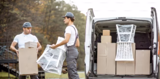 How Smart Technologies Are Enhancing NDIS Removal Services in Melbourne Two men are offloading furniture.
