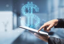 From Banks to the Algorithms: The Reign of FinTech and Digital Money man using digital money with a tablet