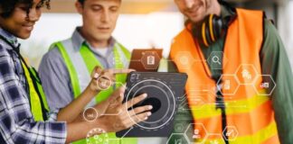 Bridging Technology and Safety: The New Frontier of Employee Wellbeing Foreman discussing employee wellbeing with a tablet