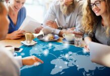 Why Startups and Enterprises Trust Global Teams for Software Delivery global teams talking over a digital map