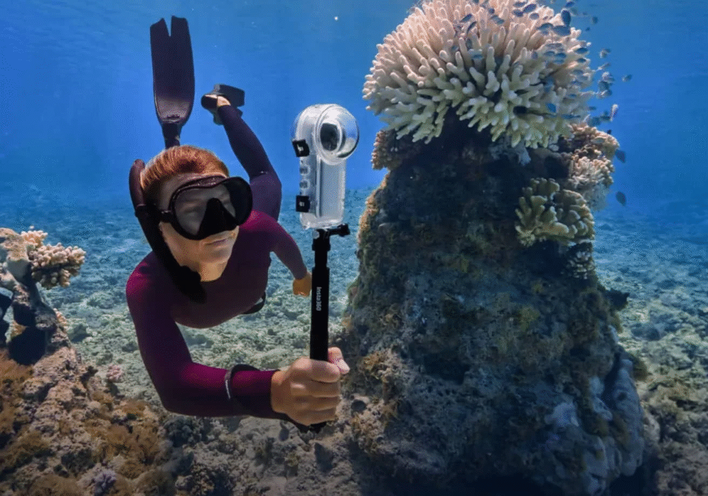 woman using an underwater camera